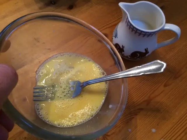 Eggs beaten in a bowl.