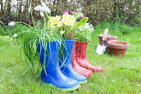 recycled boots in the garden