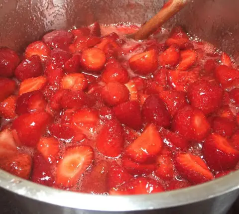 Jam making with strawberries