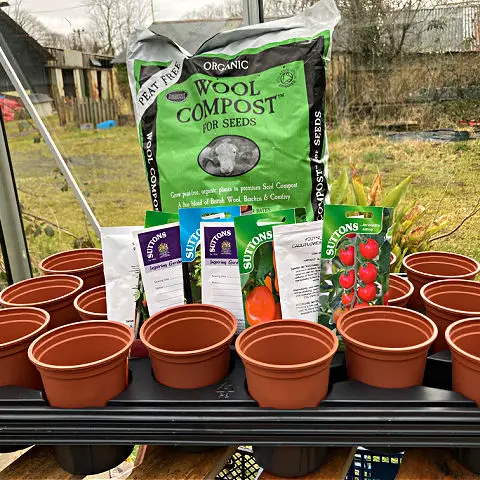 Items in this Giveaway of a Veg Seed Starter Kit include 8 packets of Suttons seeds, pots, trays and a bag of compost.